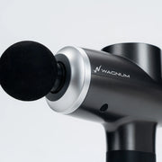 WAGNUM S5 Massage Gun with foam ball attachment.